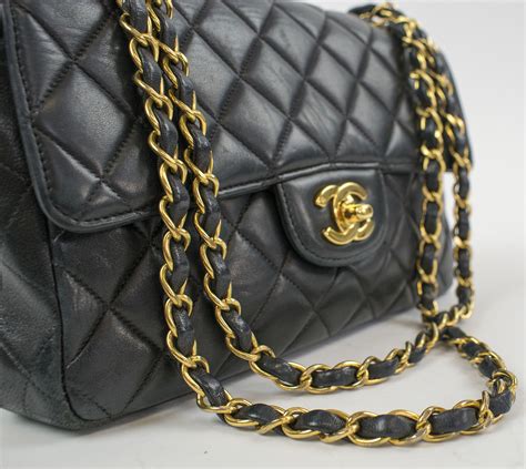 chanel bag black and gold chain|chanel quilted bag gold chain.